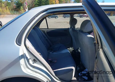 1999 Toyota Corolla Ve from USA, damaged, VIN 2T1BR12EXXC167902